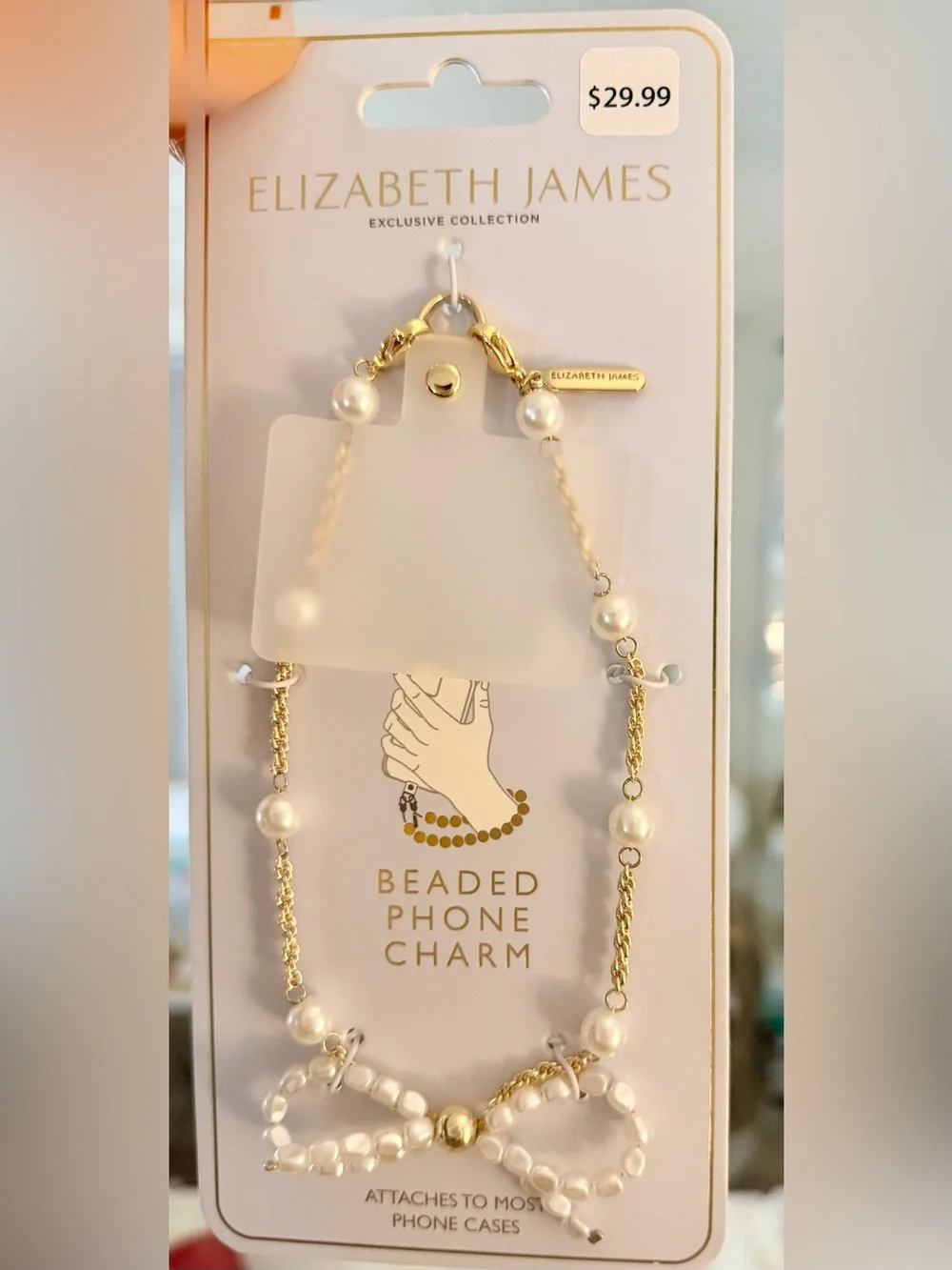 NWT Elizabeth and James Gold and White Beaded Phone Charm Strap w. Bow Detail